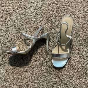 Silver high heeled shoes